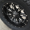 20x10 Fuel Offroad Throttle D513 black wheel - 37x13.50r20 Toyo Open Country MT tire
